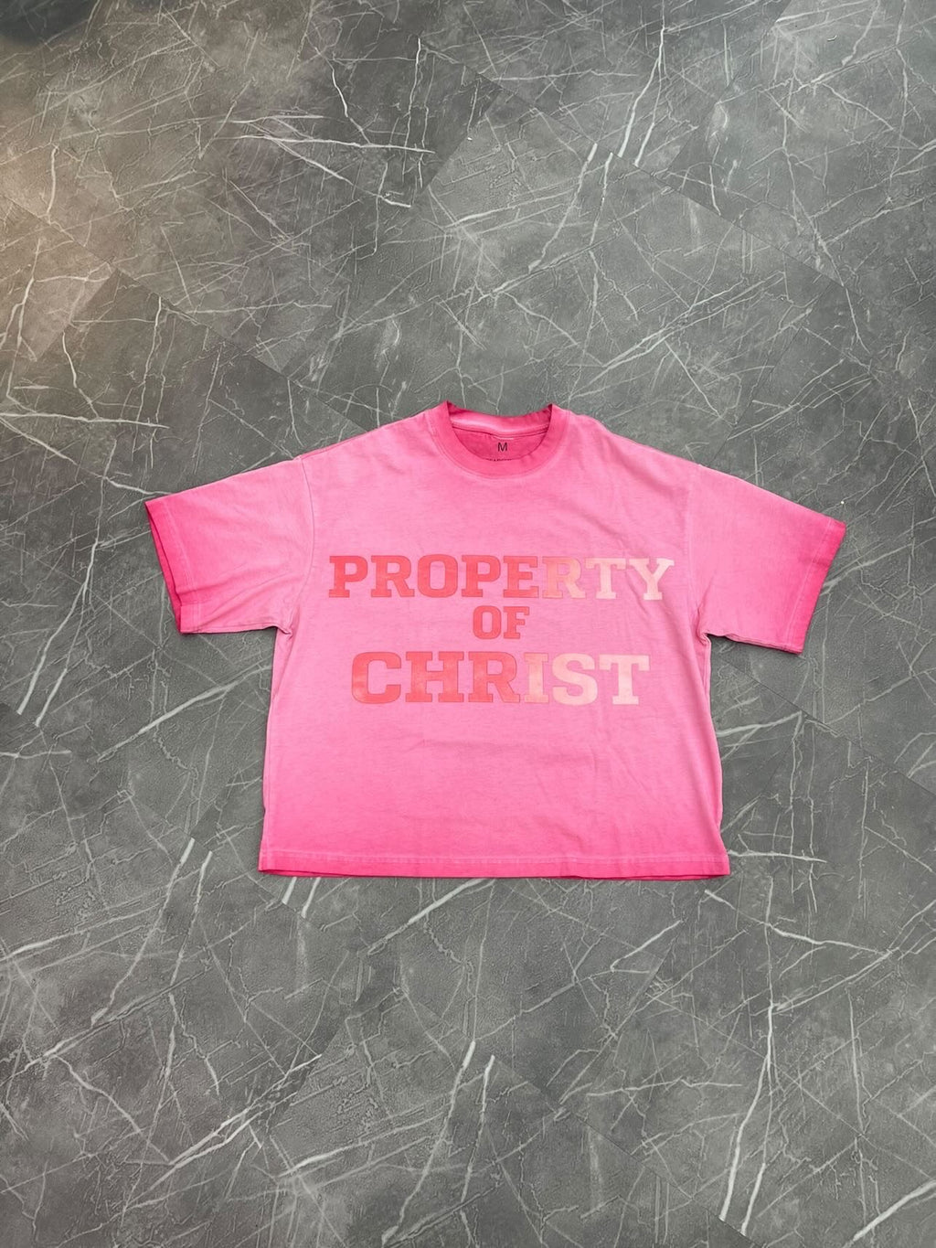 “Property of Christ Washed Pink” Tee